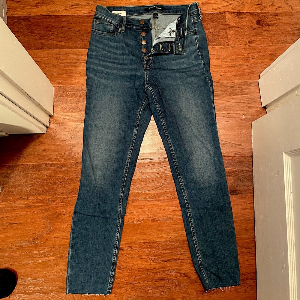 Calvin Klein Jeans. Medium dark wash.